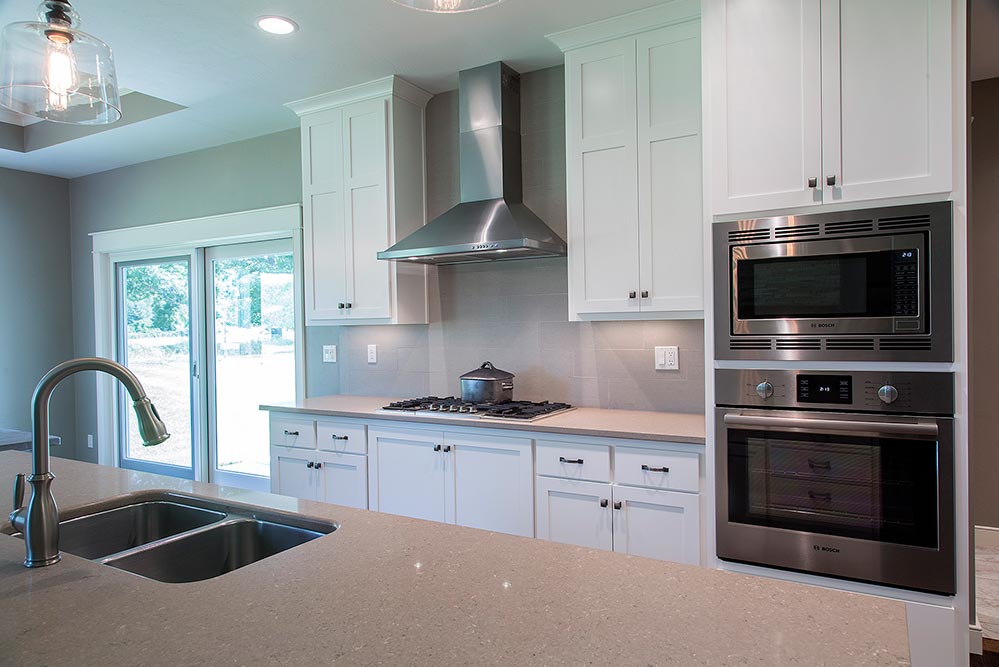 New Construction Transitional Story Kitchen